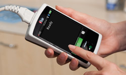 performing a spot-check with the Masimo Pronto-7